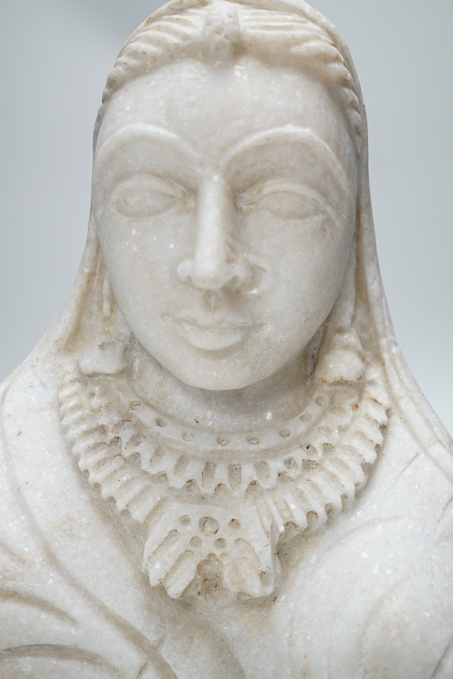 An Indian carved marble bust, 31cm